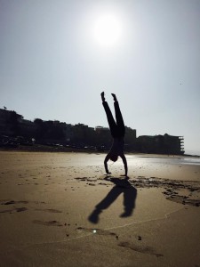 handstand at Panorama beach, Morocco
