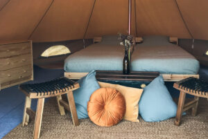 image of double bed in the glamping